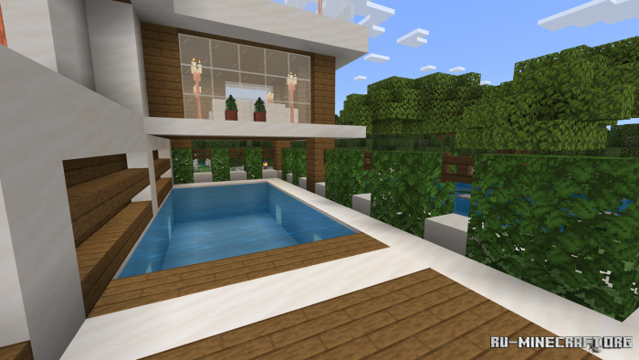 Ночной вид современного дома в Minecraft с подсветкой и бассейном