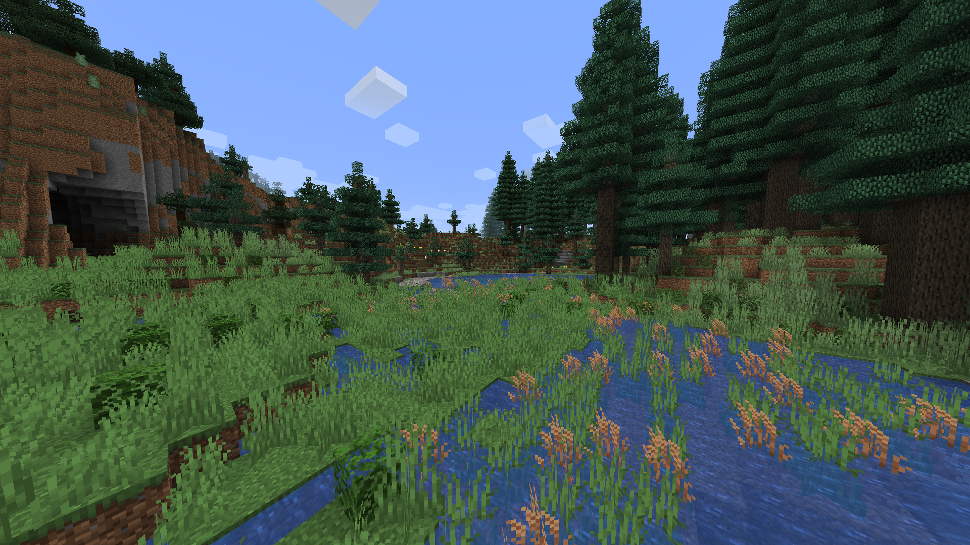 Игрок в Minecraft смотрит на закат в горах, окружённый природой