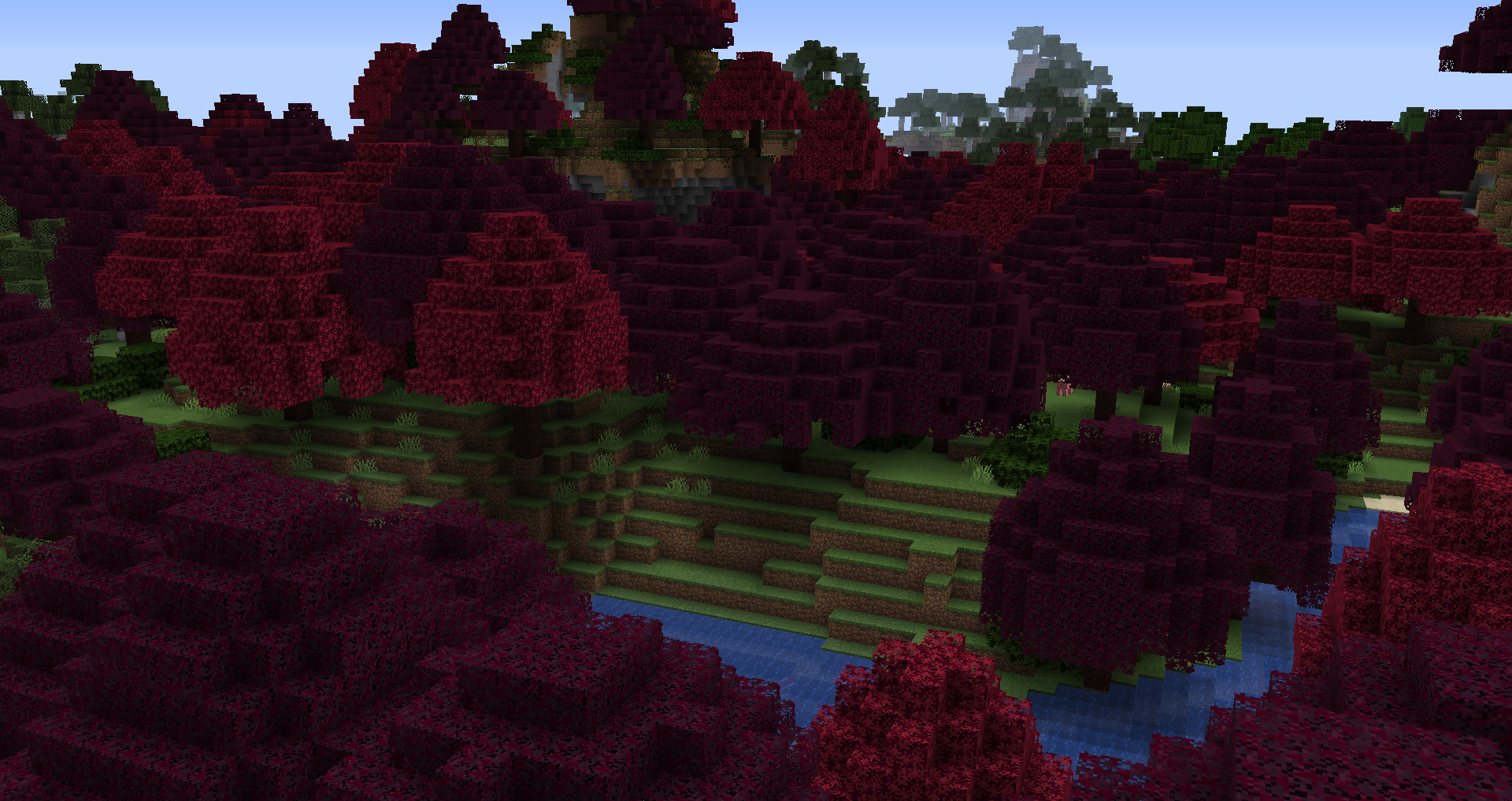 Красивый пейзаж с биомами леса, гор и реки в Minecraft