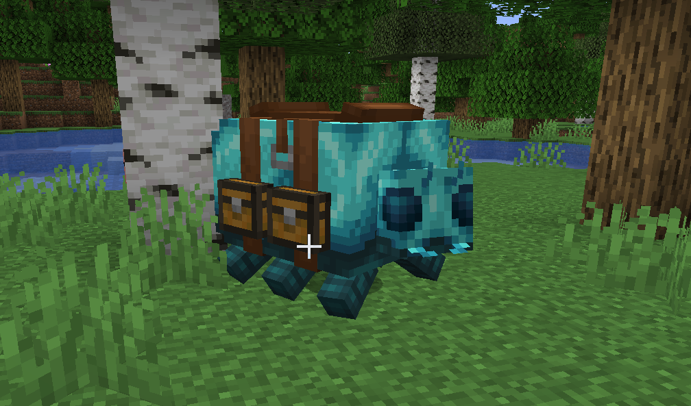 Игрок летает на элитрах над горами в Minecraft