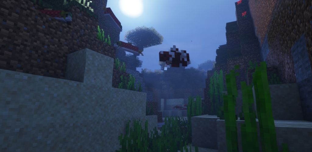 Игрок кормит бетта-рыбок в подводном мире Minecraft