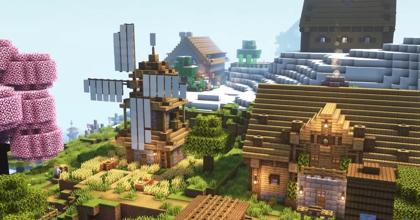 Деревня с мостами и водяными мельницами в улучшенной версии Minecraft