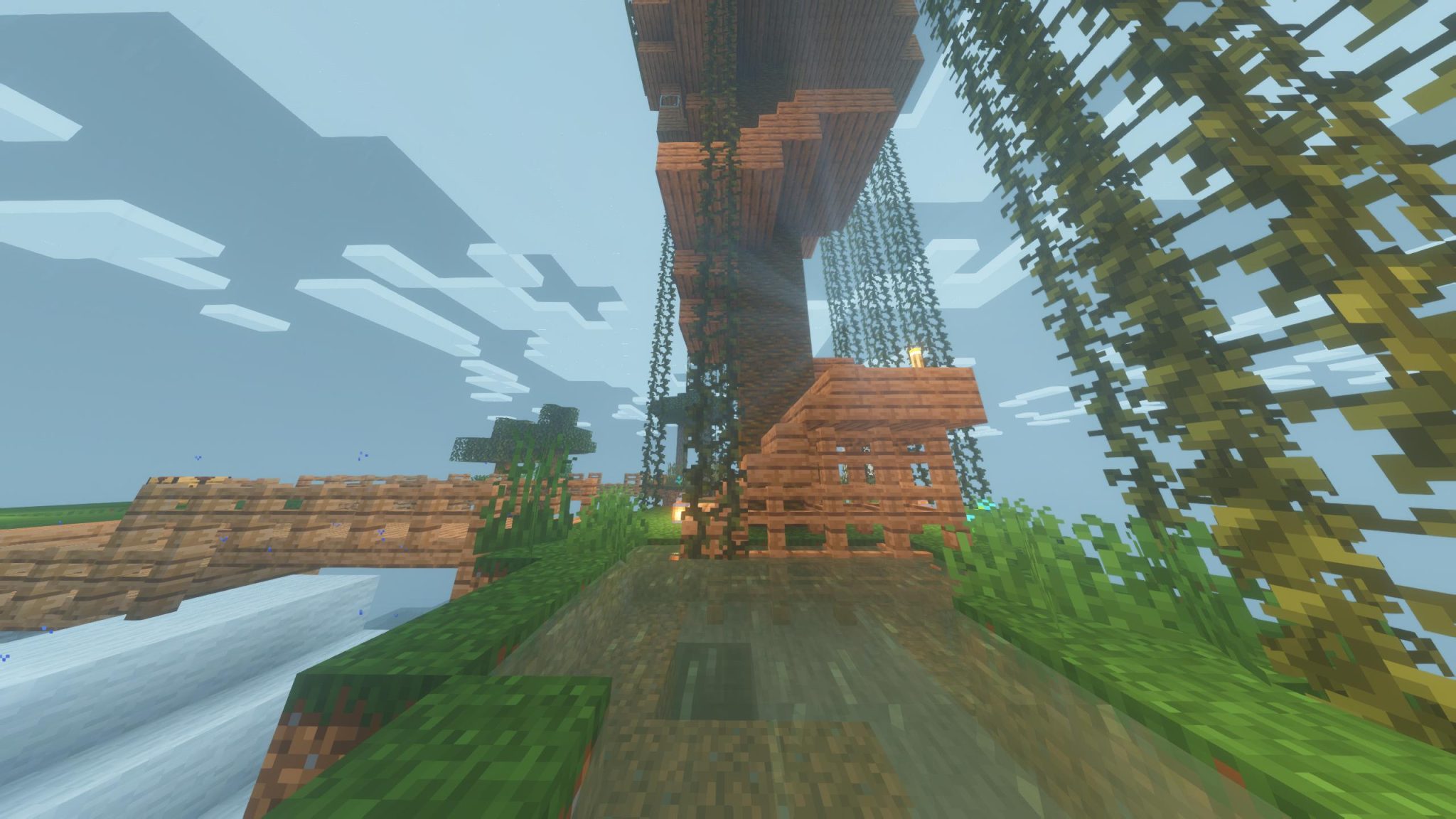 Закат в Minecraft с шейдерами, отражающийся в воде и создающий атмосферную картинку