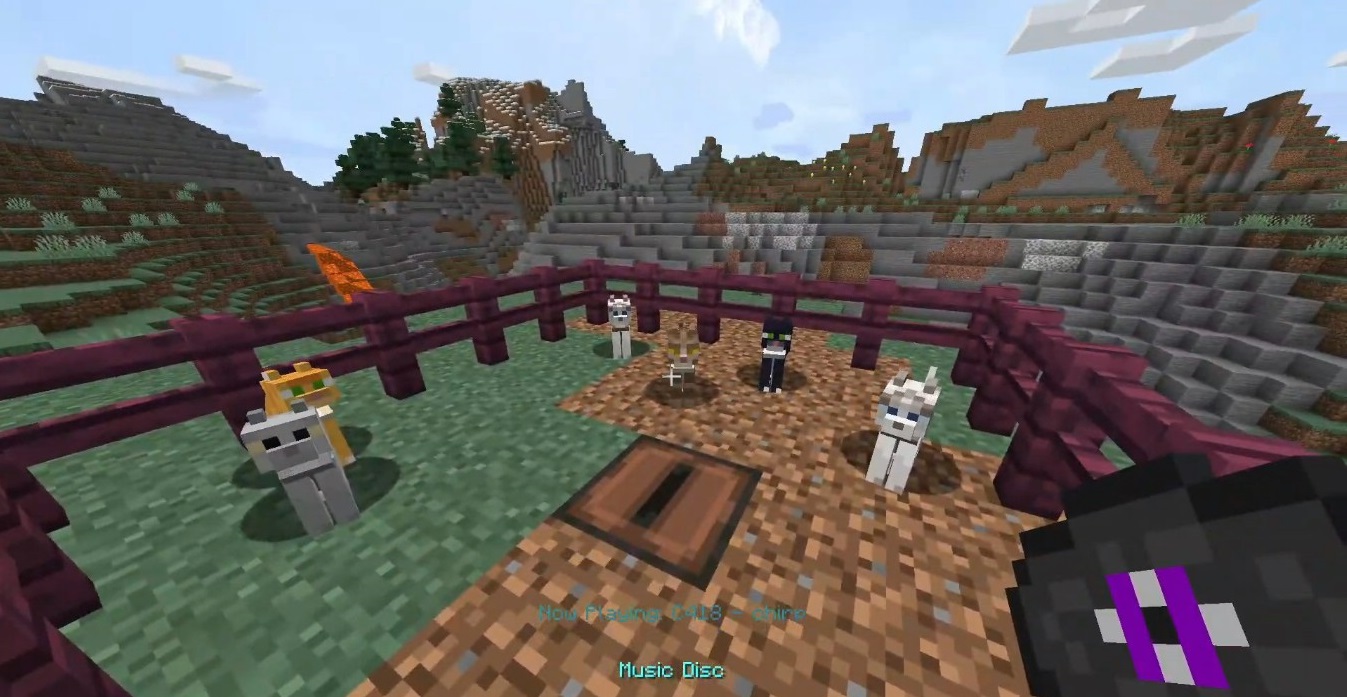 Скриншот Cat Jammies Mod в Minecraft с котиками в пижамах возле музыкального автомата