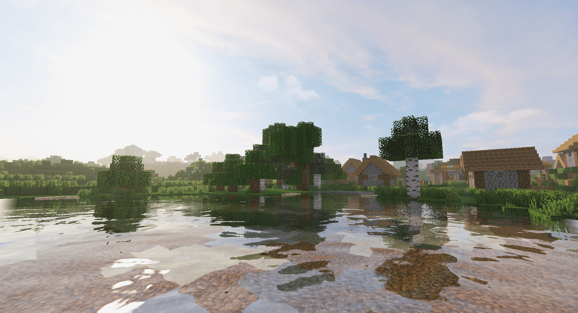 Ночной пейзаж в Minecraft с факелами и освещенным домом