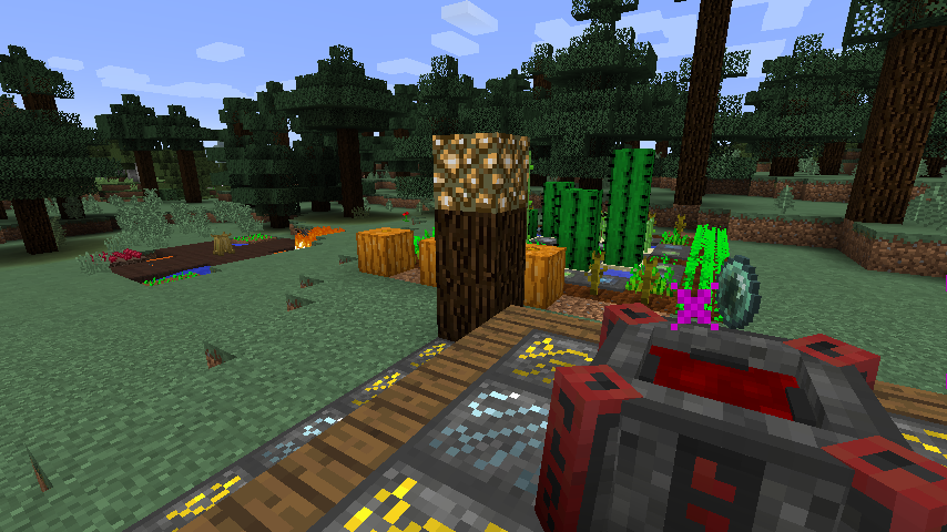 Игрок стоит на вершине горы в Minecraft, любуясь закатом