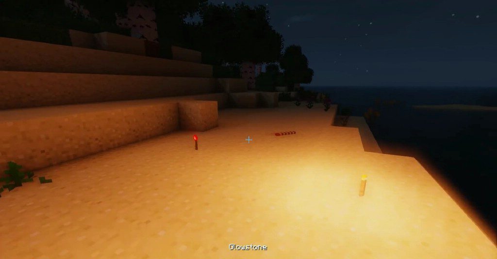 Игрок использует светящийся камень для подсветки в Minecraft
