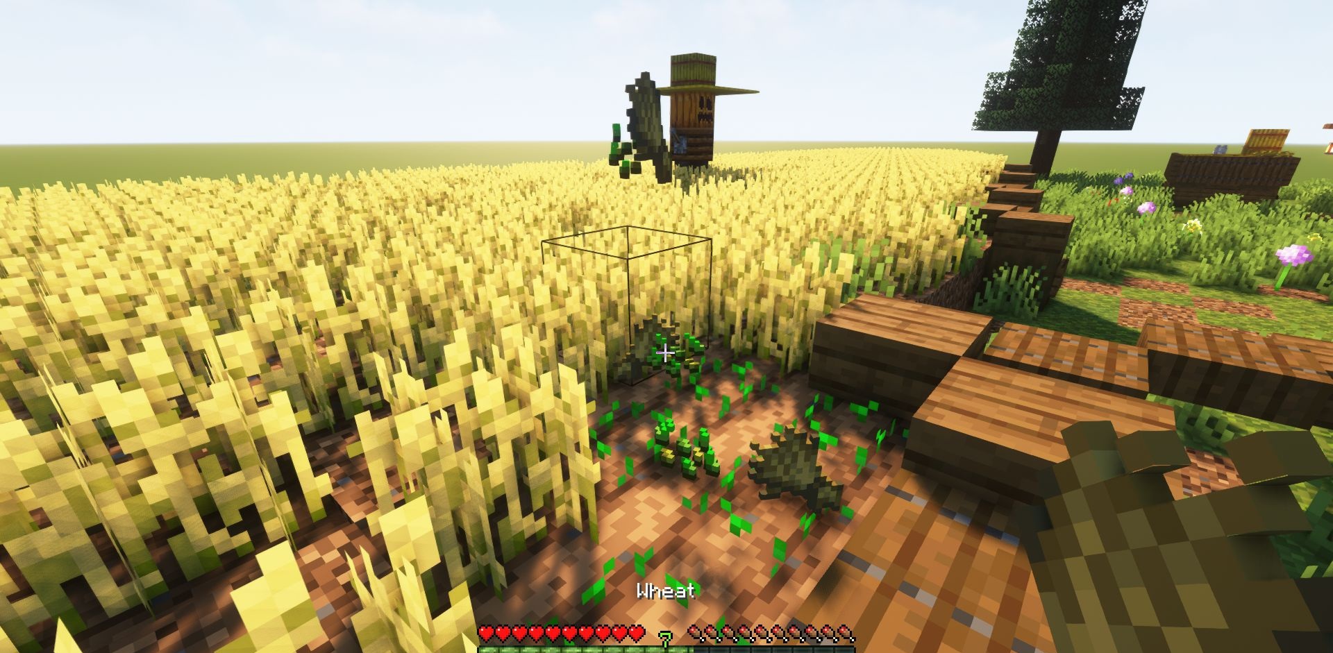 Игрок использует Harvest With Ease для быстрого сбора пшеницы и автоматической посадки