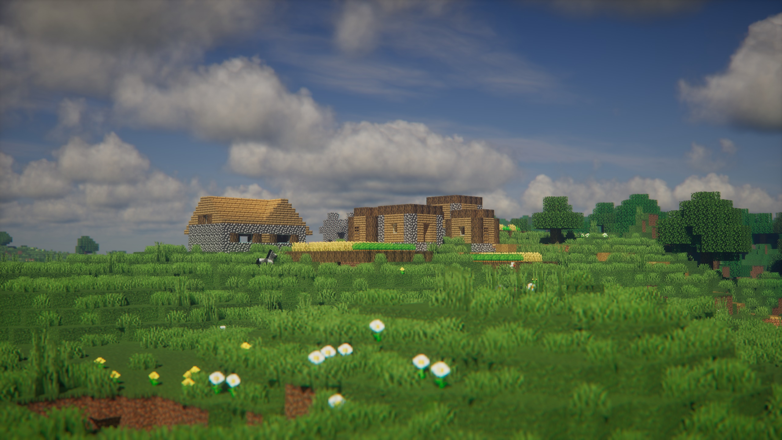 Группа игроков в Minecraft исследует горный биом с улучшенной графикой