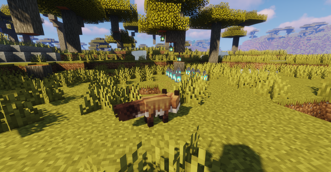 Группа разноцветных лис из текстур-пака Lanostry’s Foxes в естественной среде Minecraft