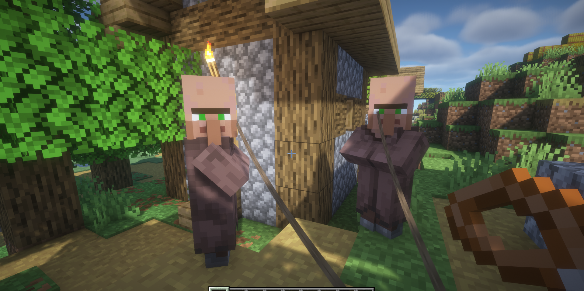 Деревенский житель привязан к забору возле фермы пшеницы в Minecraft
