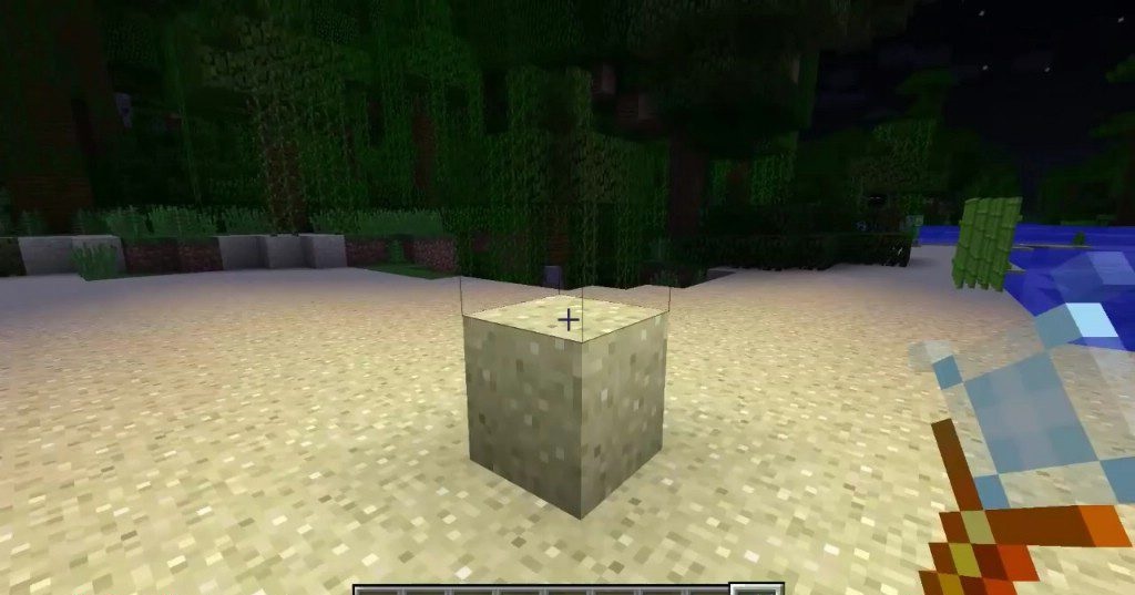 Игрок использует Lighting Wand для подсветки пещеры в Minecraft