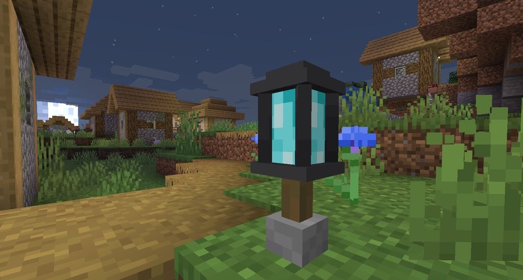 Ночной город в Minecraft с уличными фонарями из мода Macaw’s Lights and Lamps