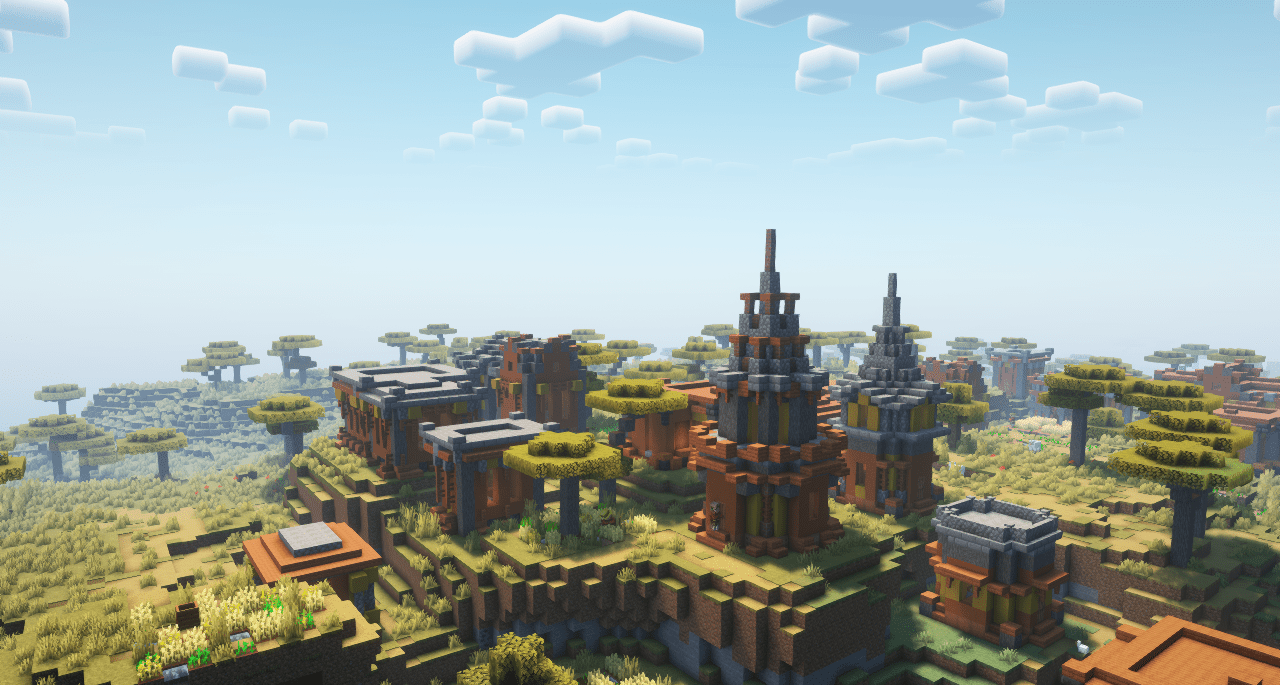 Ночной вид деревни в Minecraft с модом Lio’s Overhauled Villages: освещенные улицы и дома