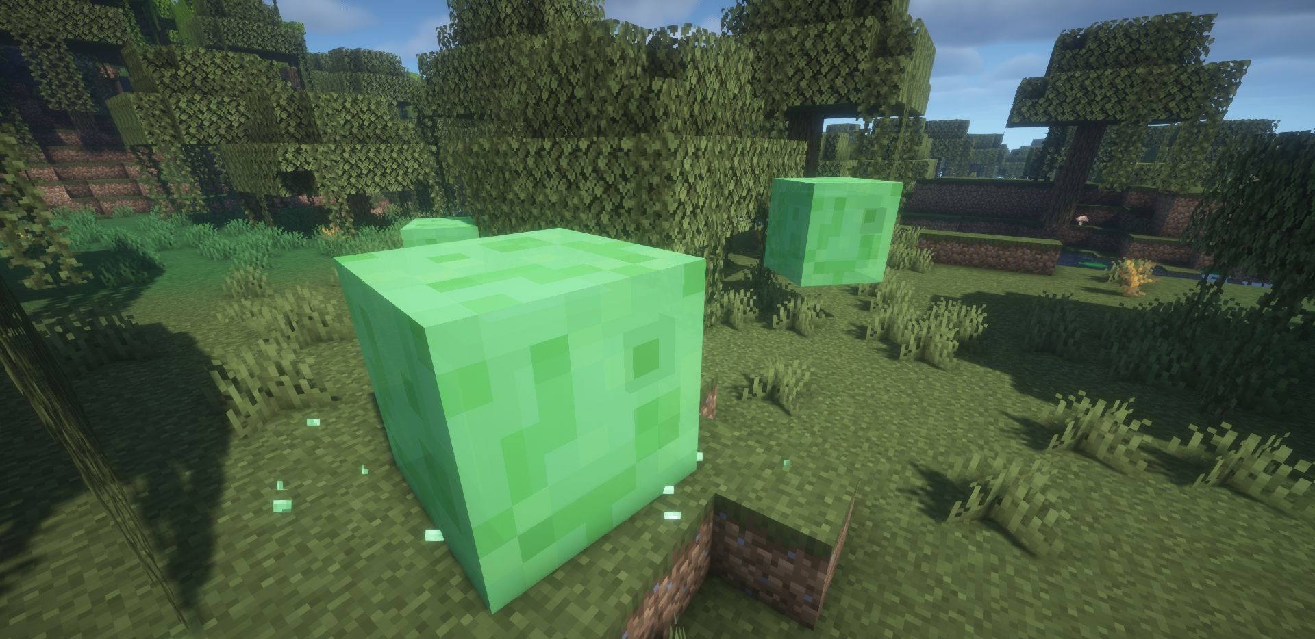 Игровой скриншот мода Mcstrugs’s Slime, показывающий выделение чанков со слизью в Minecraft