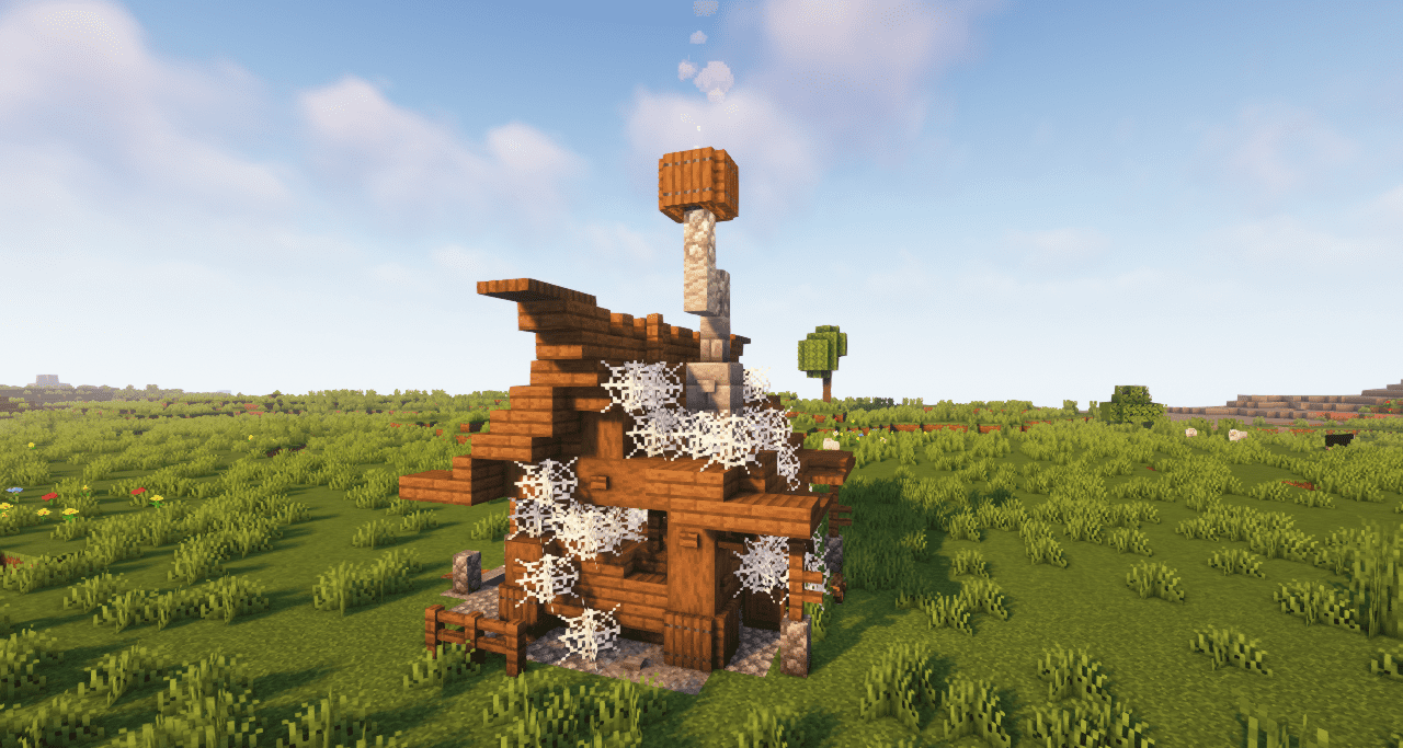 Средневековый замок в Minecraft с башнями и мостами из мода Medieval Buildings