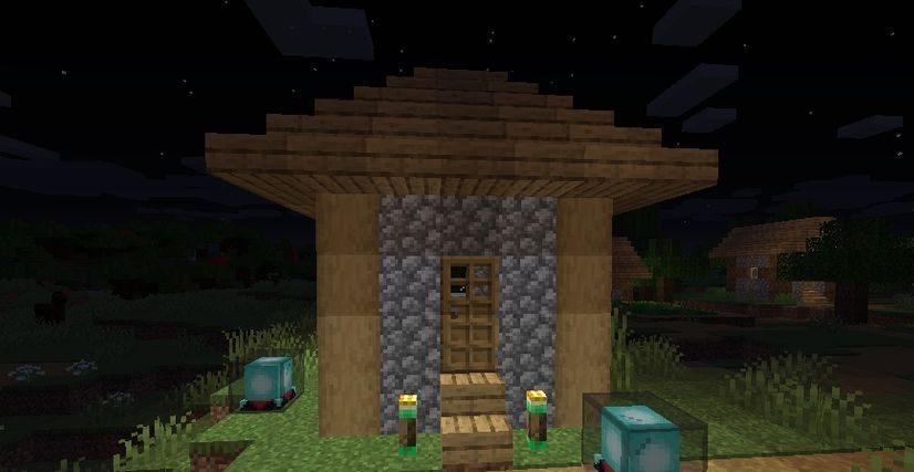 Группа игроков в Minecraft исследует пещеру с магическими факелами