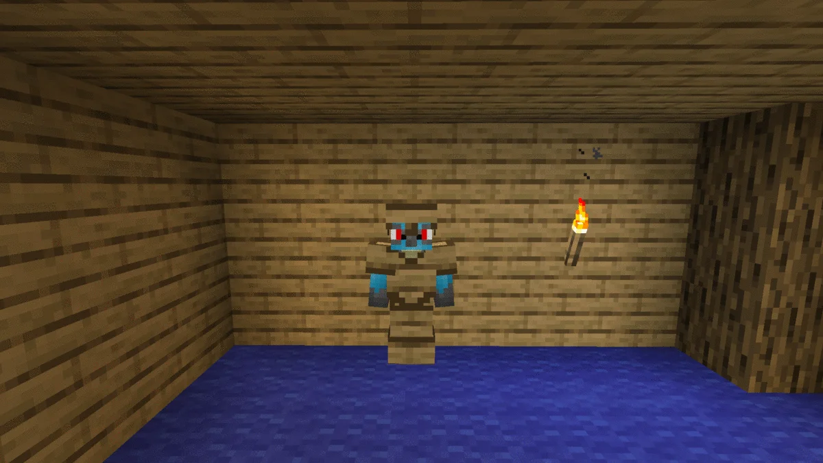 Игрок добывает ресурсы киркой в шахте Minecraft