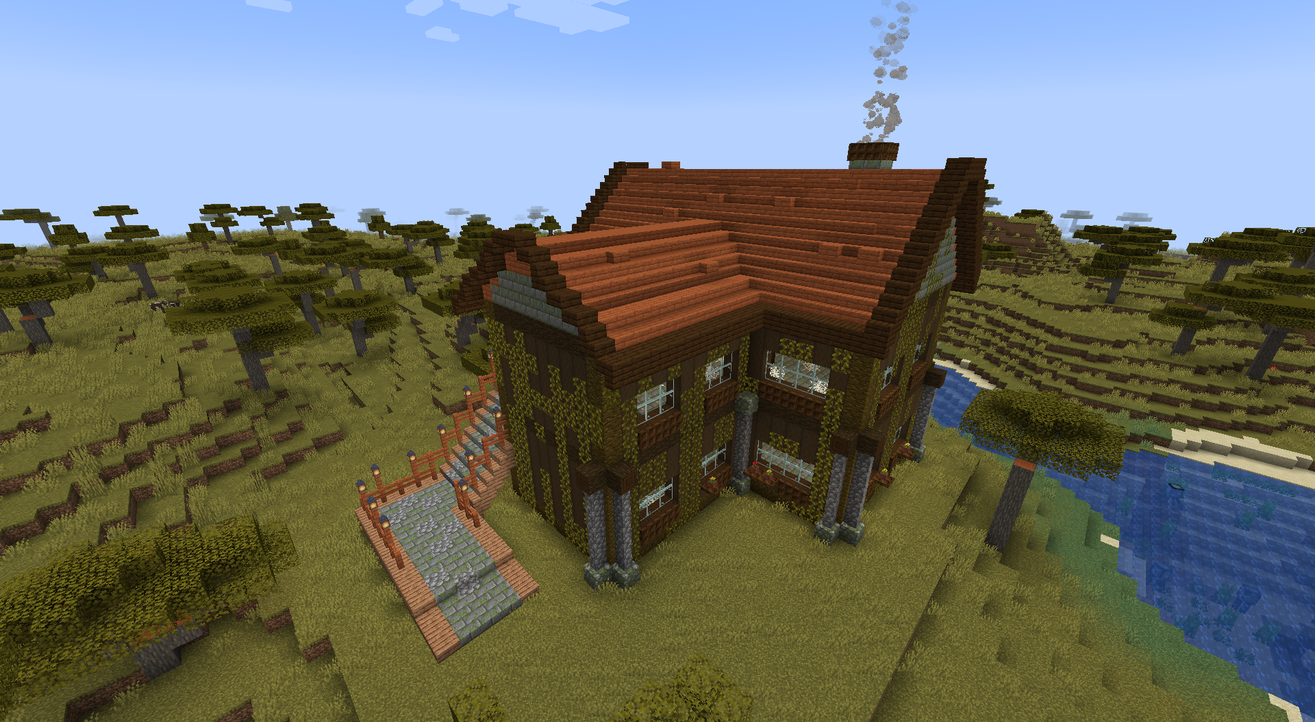 Современный дом в Minecraft с большими окнами и панорамным видом