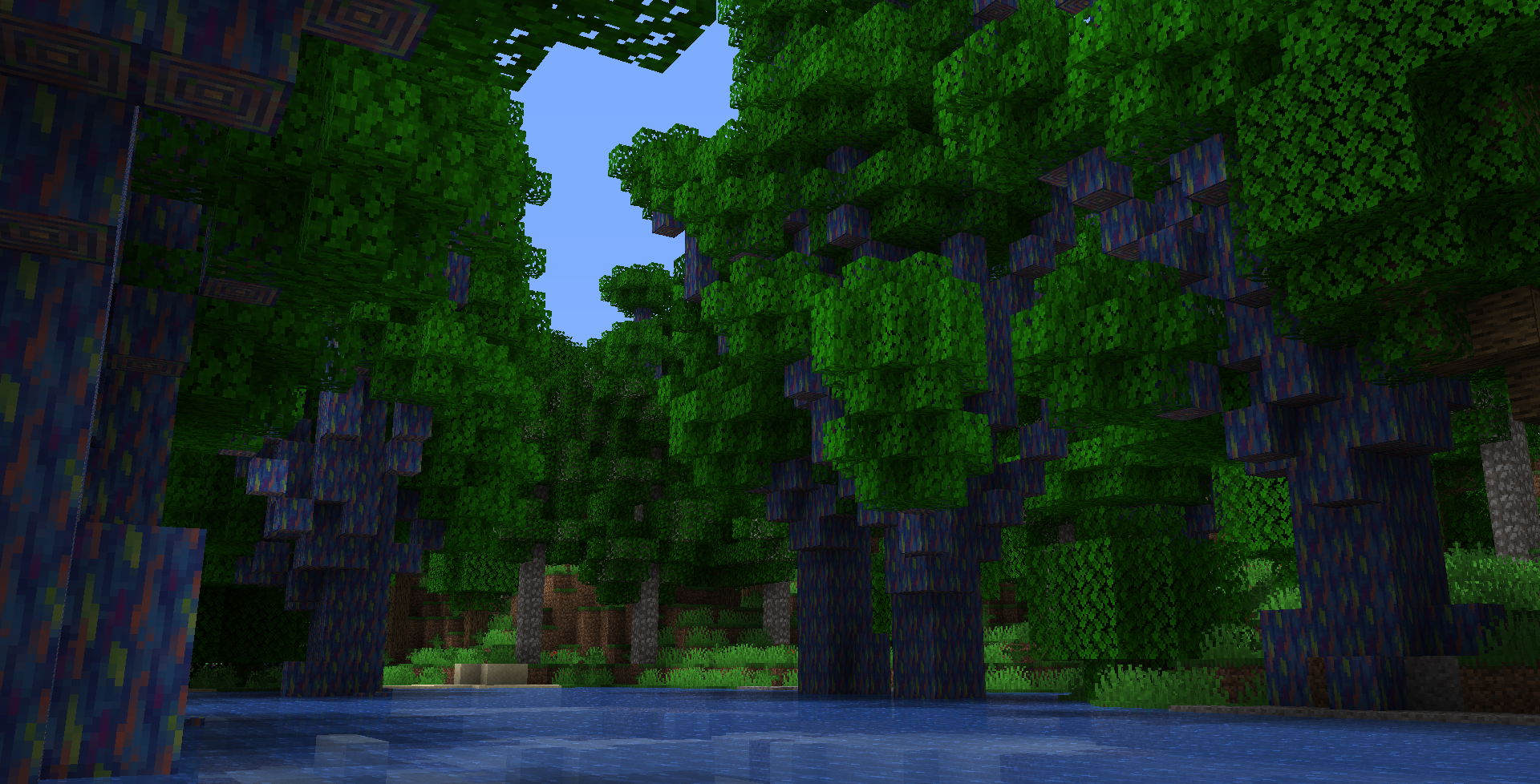 Яркий лес с разноцветными деревьями в Minecraft