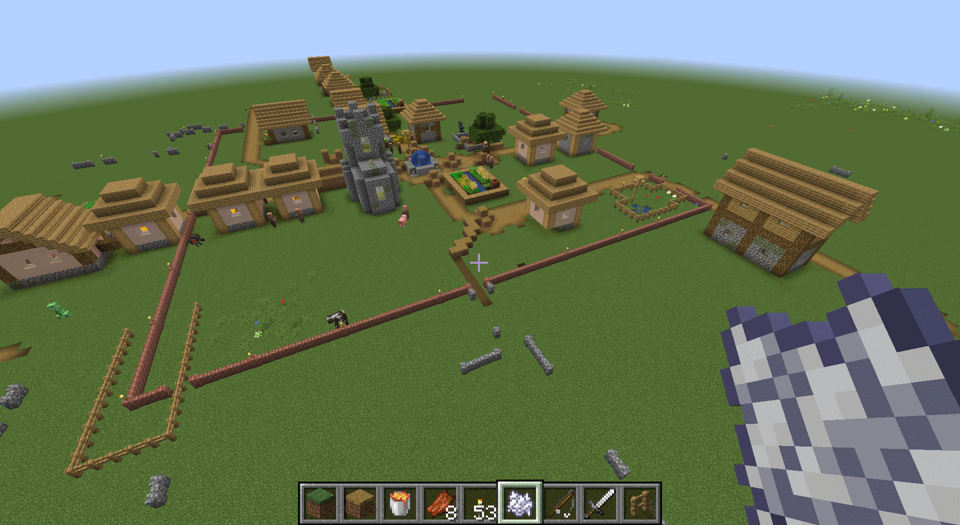 Деревенские жители строят защитные стены в Minecraft с модом Regrowth