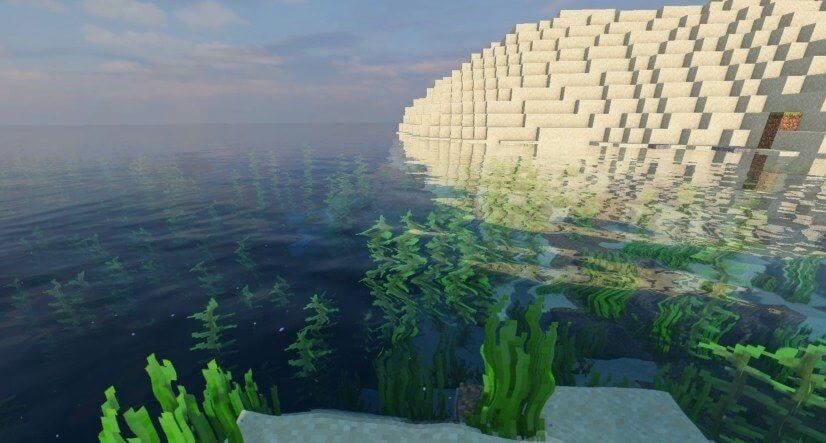Деревня в Minecraft с шейдерами projectLUMA: тёплое освещение и детализированные текстуры