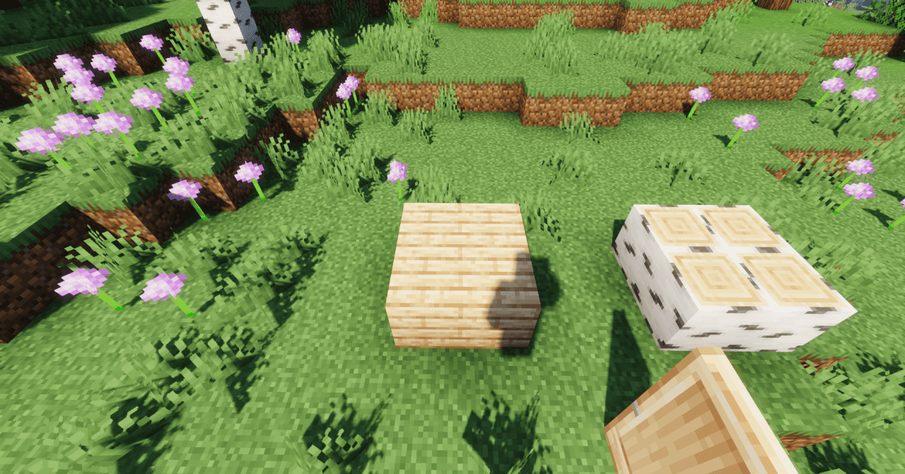 Деревня в Minecraft с домами из дерева и фермой