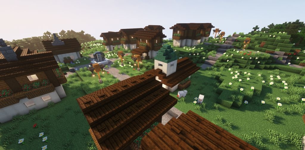 Игрок сражается с разбойниками возле новой деревни в Minecraft