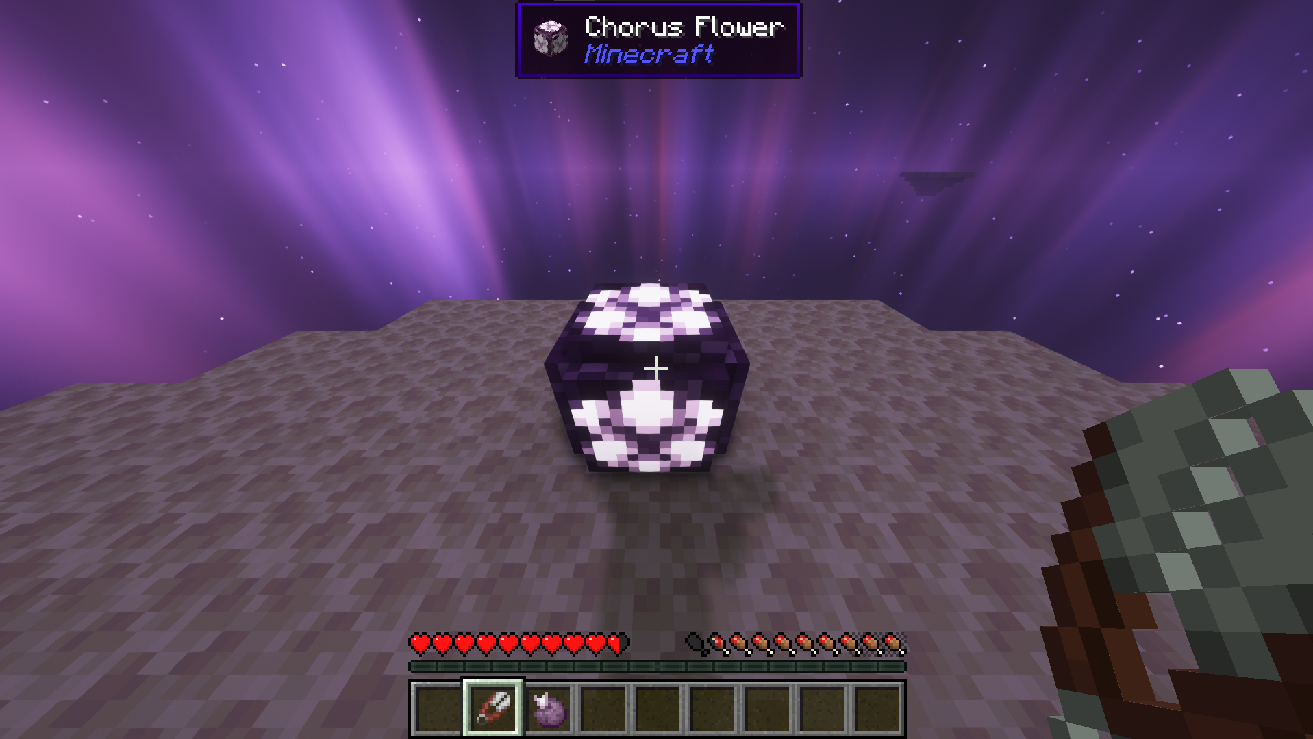 Красивый закат в Minecraft с видом на деревянный дом у озера