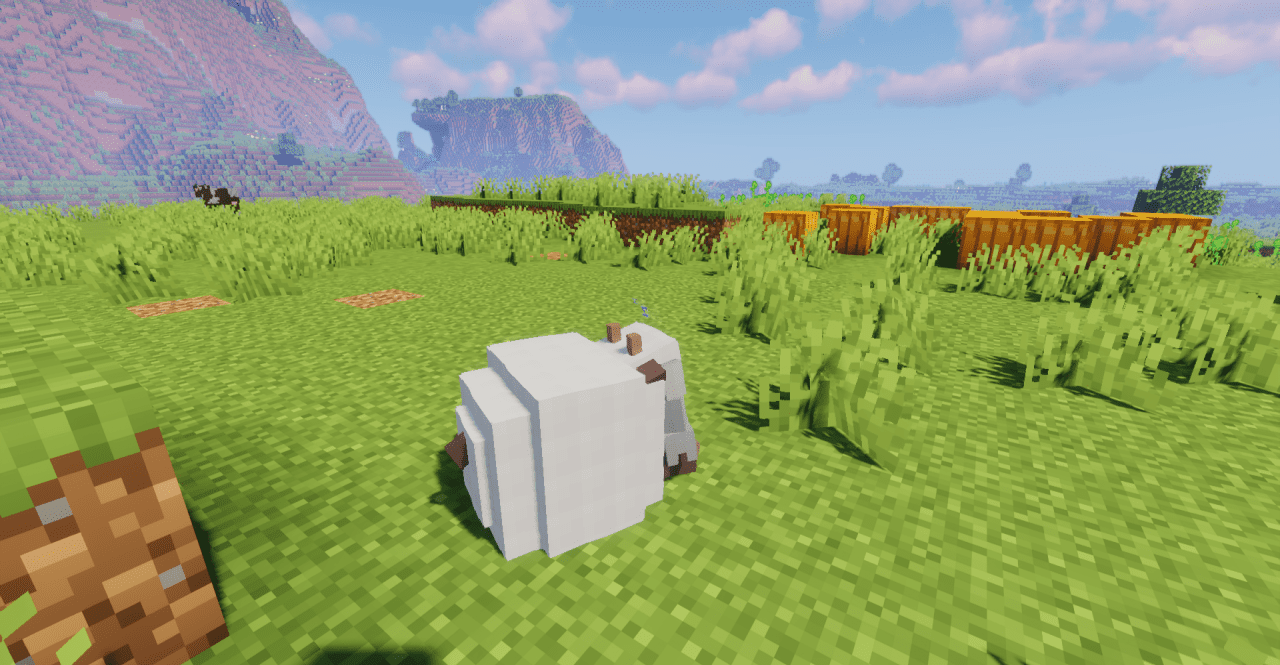 Группа Wooloo Sheep в Minecraft, пасущихся на лугу