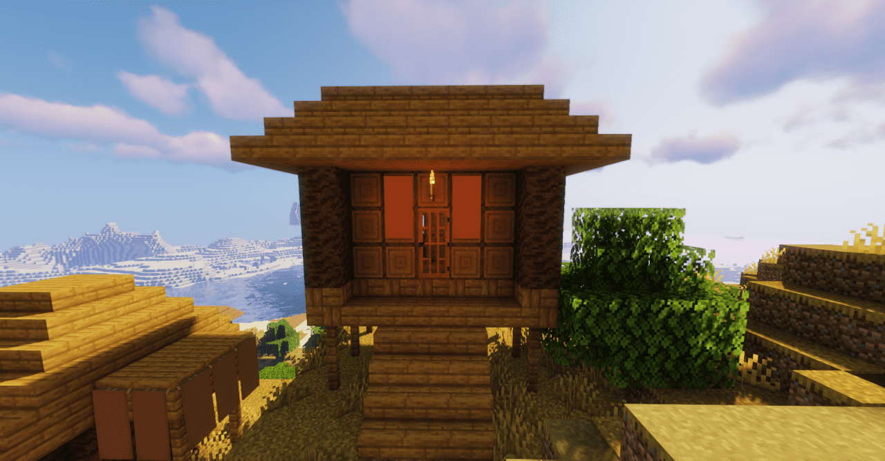 Игровой скриншот Minecraft с текстур-паком Golden Savanna, демонстрирующий красивый закат в саванне